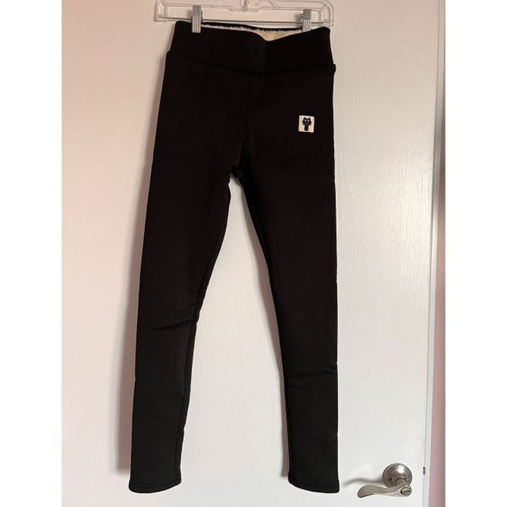 Super warm leggings. Size Small but runs small.